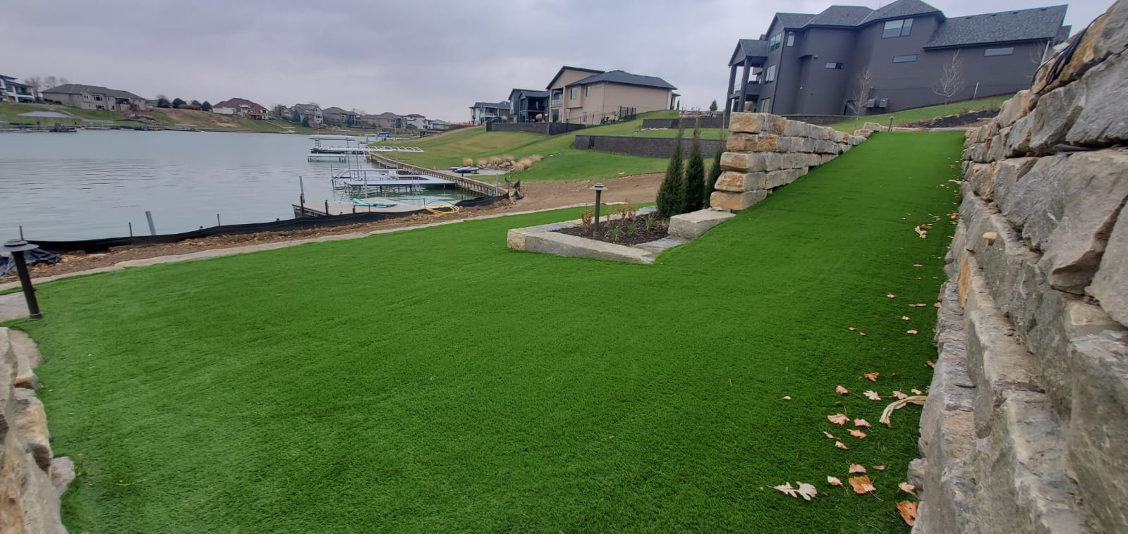 Artificial Turf on Lakefront Property installed by Sportzturf